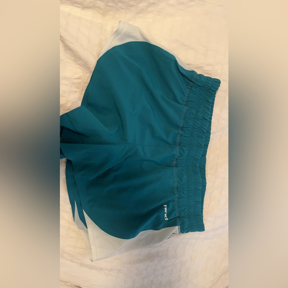 green shorts